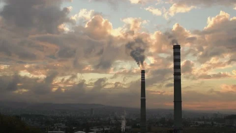 Smoking chimneys at sunset, time lapse. Stock Footage 220649526