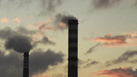 Smoking chimneys at sunset, time lapse. Stock Footage 220649566