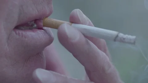 Smoking a cigarette close up Stock Footage 74118291
