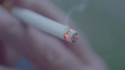 Smoking a cigarette close up Stock Footage 74118513