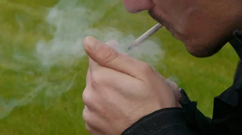 Smoking a cigarette 스톡 동영상 20370376