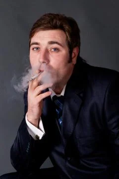Smoking a cigarette Stock Photos