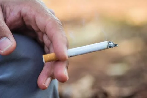 Smoking cigarette Stock Photos