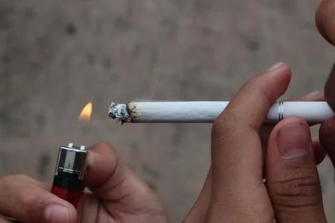 Smoking a cigarette Stock Photos