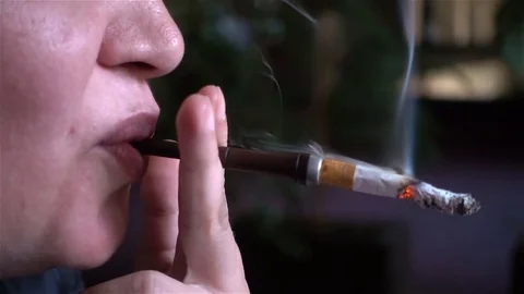 Smoking Cigarette Slow Motion Stock Footage 81978693