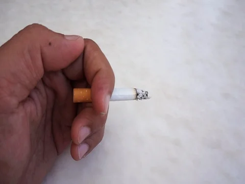 Smoking cigarettes Stock Footage 86717777