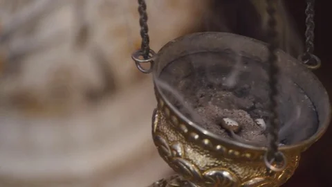Smoking device in the middle of the ritual. Close-up slow motion footage of a Stock Footage 81542144