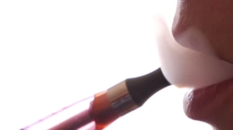 Smoking electronic cigarette Stock Footage 50828022