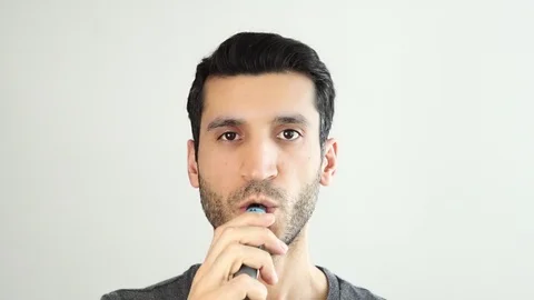 Smoking electronic cigarette Stock Footage 108492275