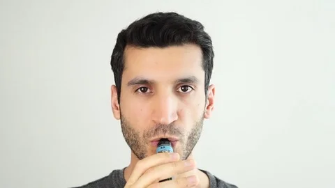 Smoking electronic cigarette Stock Footage 108492337