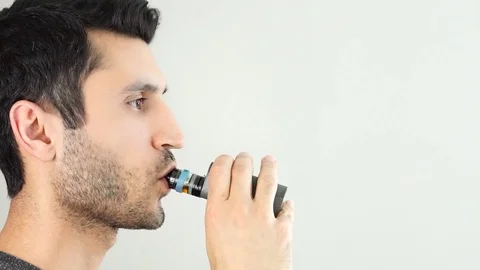 Smoking electronic cigarette Stock Footage 108492413