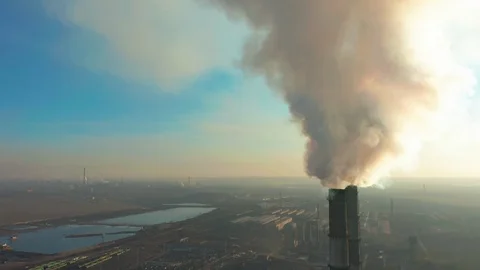 Smoking factory chimneys. Environmental problem of pollution of environment and Stock Footage 103235235