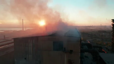 Smoking factory chimneys. Environmental problem of pollution of environment and Video stock 163638472