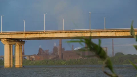 Smoking factory at sunset. Dramatic landscape at sunset. Factory with a smoking Stock Footage 217822958
