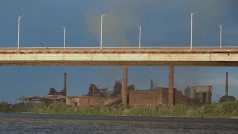 Smoking factory at sunset. Dramatic landscape at sunset. Factory with a smoking Stock Footage 217823190