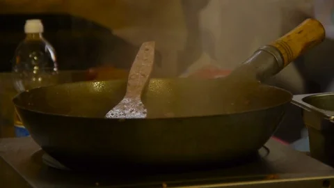 The smoking frying pan, something is cooked in a frying pan Video stock 84252182