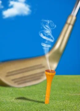 Smoking golf tee 스톡 사진