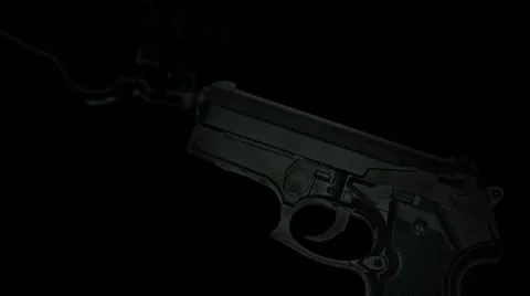 Smoking gun on black Stock Footage 9937430
