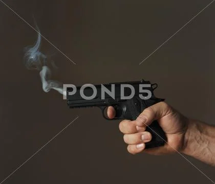 Smoking gun Stock Photos