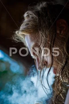 Smoking hipster man Stock Photos