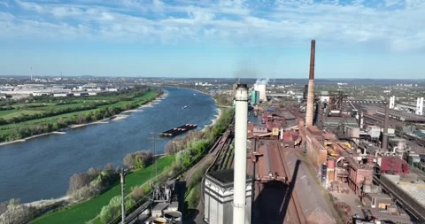 Smoking hot smoke stack at cokes factory near Duisburg, Germany, Aerial drone 스톡 동영상 311618299