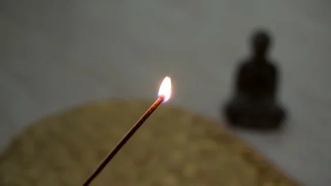 Smoking incense buddha statue Stock Footage 76928595