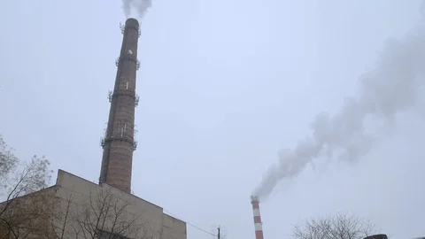 Smoking industrial pipes Stock Footage 87204089