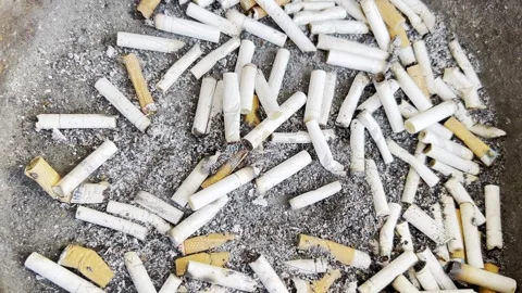 Smoking kills, a bunch of smoked cigaret... | Stock Video | Pond5