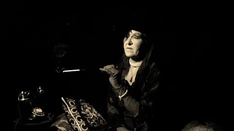 The Smoking Lady (Slow Motion) Stock Footage 128836604