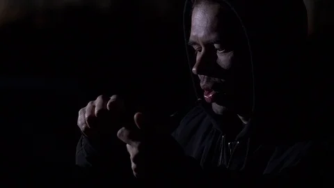 Smoking man in the dark. Slow motion Stock Footage 75267632
