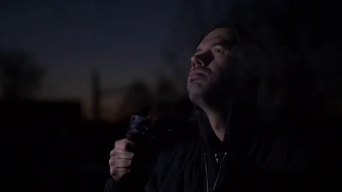 Smoking man in the dark. Slow motion Stock Footage 75269072