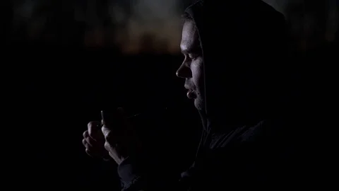 Smoking man in the dark. Slow motion Stock Footage 75269955