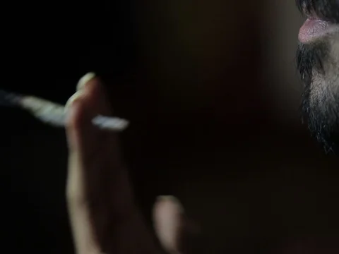 Smoking a marijuana joint Stock Footage