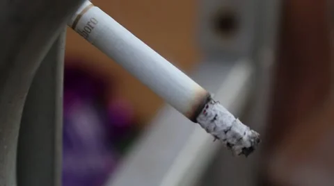 Smoking marlboro light cigarette Stock Footage 45564584