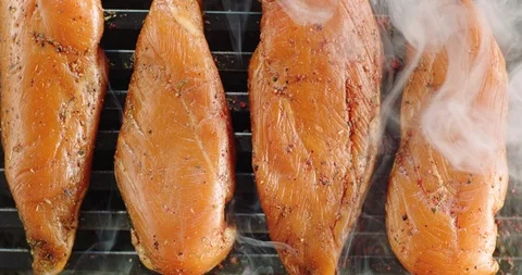 Smoking meat: chicken breasts Stock Footage 124073687