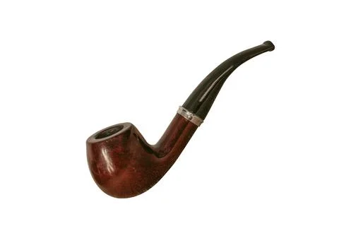 The Smoking pipe is on the table. Gray background. Stock Photos