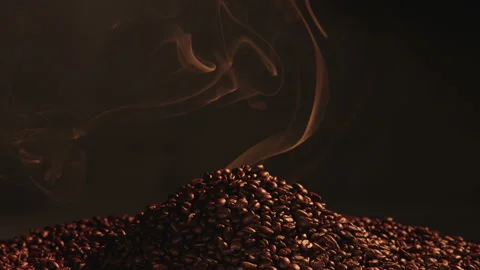 Smoking roasted pile of coffe beans Stock Footage 145273907