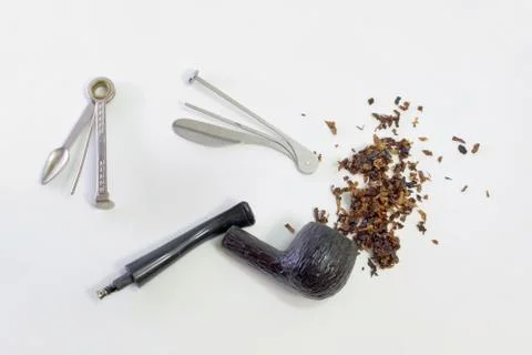Smoking set: tamper, cleaner (multitool), wooden pipe with metal filter (cool Stock Photos