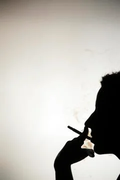 Smoking silhouette Stock Photos
