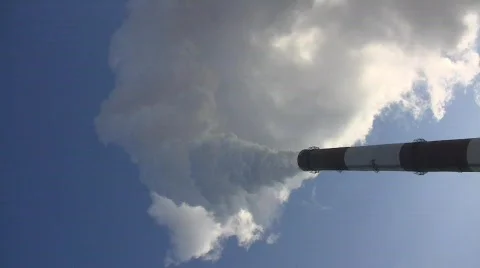 Smoking stack of the thermal power station against a blue sky 스톡 동영상 587502