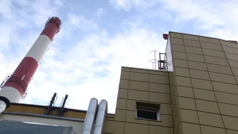 Smoking stack of the thermal power station against a blue sky 스톡 동영상 95017158