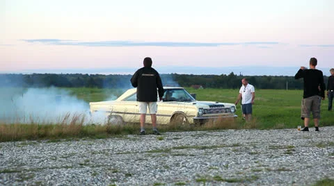 Smoking Tyres Stock Footage 23547229