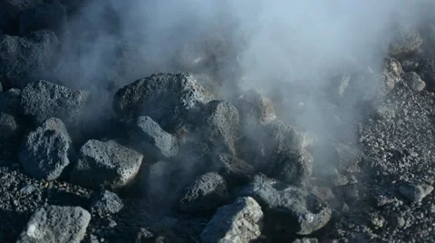 Smoking volcanic rocks Stock Footage 50899831