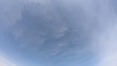 Smoky clouds move slowly across the sky. Timelapse. Stock Footage 129601587