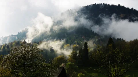 Smoky clouds time lapse in mountain village Stock Footage 38145945