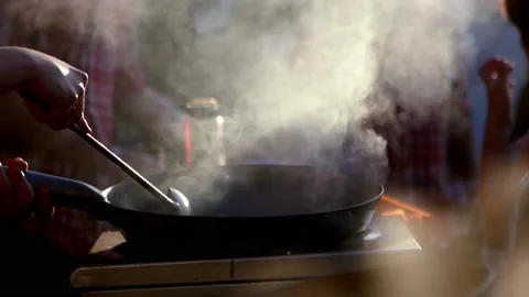Smoky cooking Stock Footage 236987980