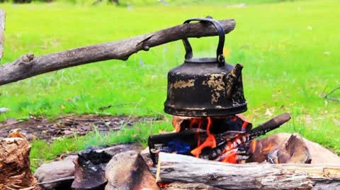 Smoked Tourist Kettle On Camp Fire Stock Photo, Picture and