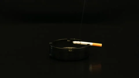 Smoldering cigarette time lapse 4K Video stock 46487570
