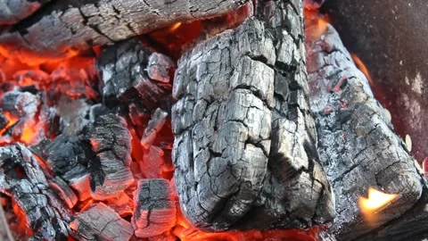 Smoldering coal, fiery background orange flame burns out. Fire danger video Stock Footage