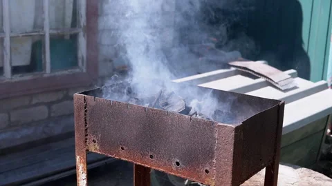 Smoldering coals in the grill Stock Footage 293158635
